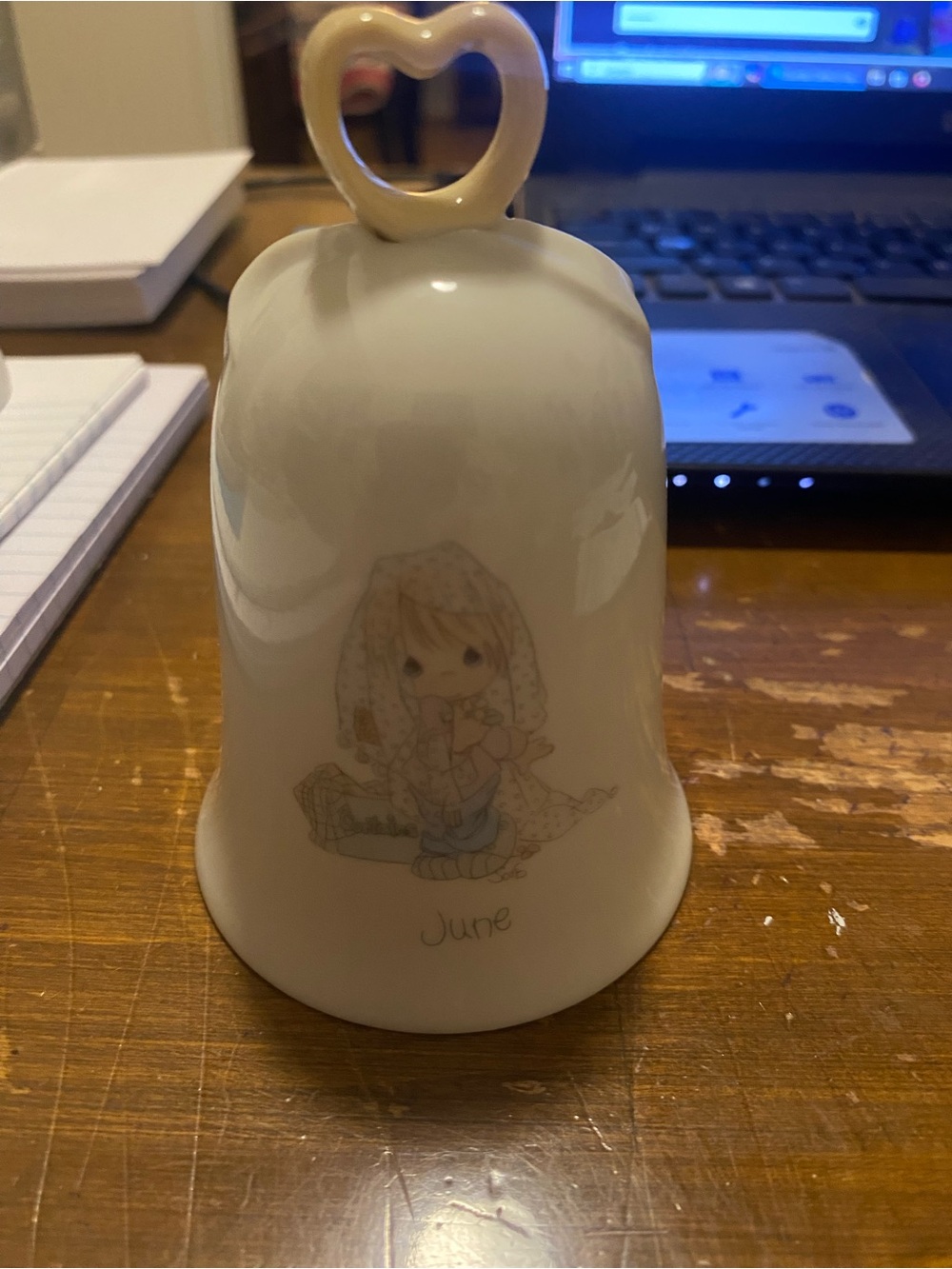 Enesco Cream Ceramic Bell with June Illustration